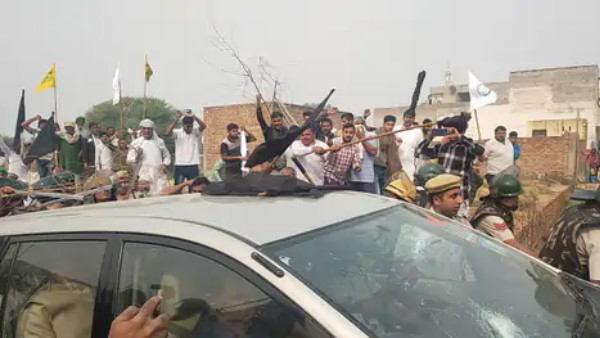 Farmers in Hisar protest & show black flags to BJP MP Ram Chander Jangra, his car vandalised Farmers in Hisar protest & show black flags to BJP MP Ram Chander Jangra, his car vandalised