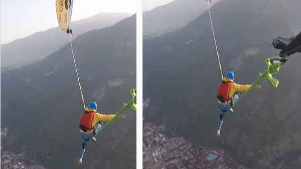 हजारों फीट ऊपर रस्सी पर स्टंट कर चल रहा था रहा शख्स हजारों फीट ऊपर रस्सी पर स्टंट कर चल रहा था रहा शख्स