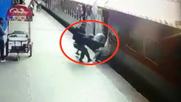 चलती ट्रेन में चढ़ने की कोशिश में गिरी महिला चलती ट्रेन में चढ़ने की कोशिश में गिरी महिला
