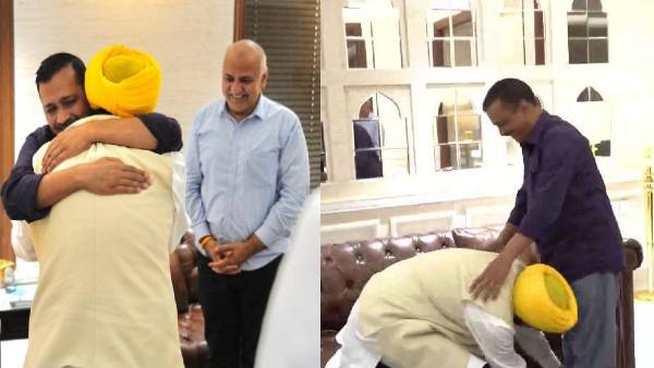 केजरीवाल के पैर छूने पर चढ़ा सियासी पारा