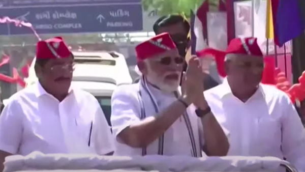 Watch Video: PM Narendra Modi roadshow in Ahmedabad, Gujarat Watch Video: PM Narendra Modi roadshow in Ahmedabad, Gujarat