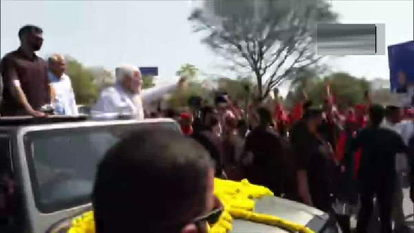 Watch Video: Prime Minister Narendra Modi roadshow Gandhinagar, Gujarat 
