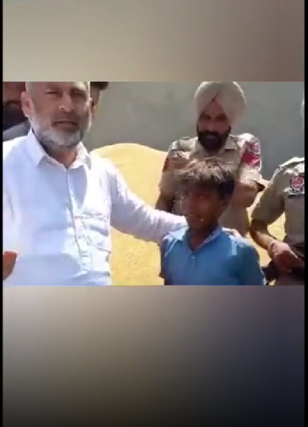 Punjab gurdaspur ASI slaps child in presence of Cabinet Minister Lal Chand Kataruchak, suspended