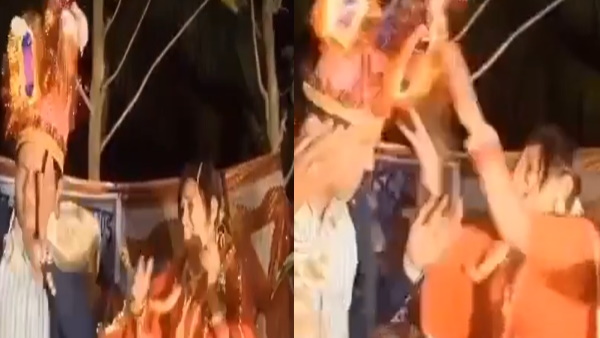 एक दूसरे को जड़े तड़ा-तड़ा थप्‍पड़