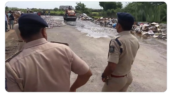 Watch Video: Thousands of liquor bottles were destroyed in surat gujarat