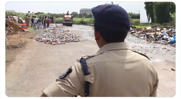 Watch Video: Thousands of liquor bottles were destroyed in surat gujarat