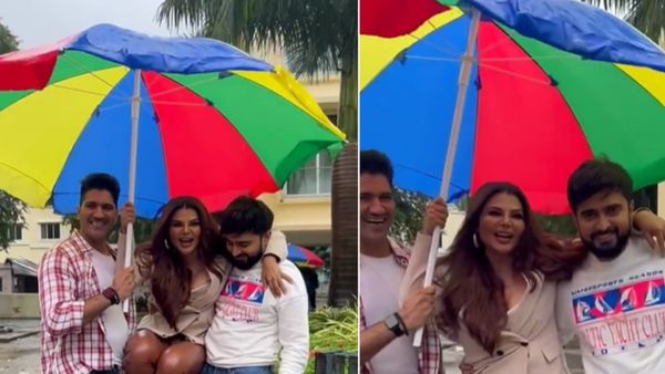 आदिल संग बारिश का ले रहीं मजा