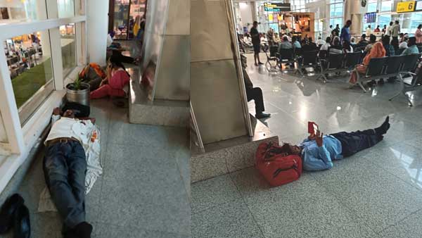 फर्श पर लेटकर इंतजार किए यात्री