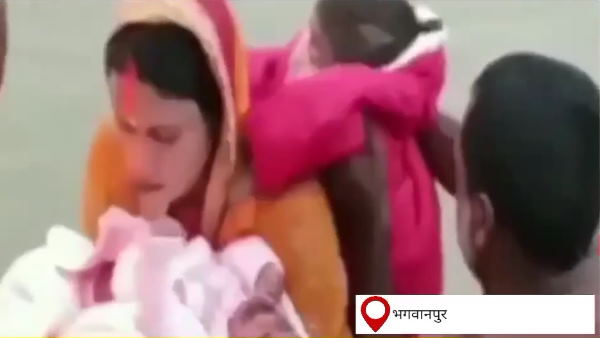 women offering prayer while having both kids in hand 