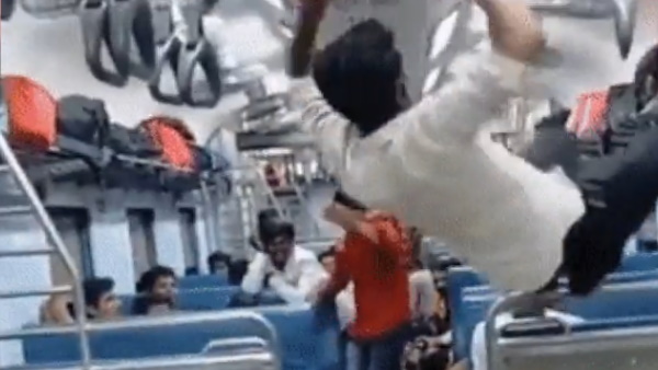 शख्‍स को देसी स्‍पाइडमैन कर रहे लोग 