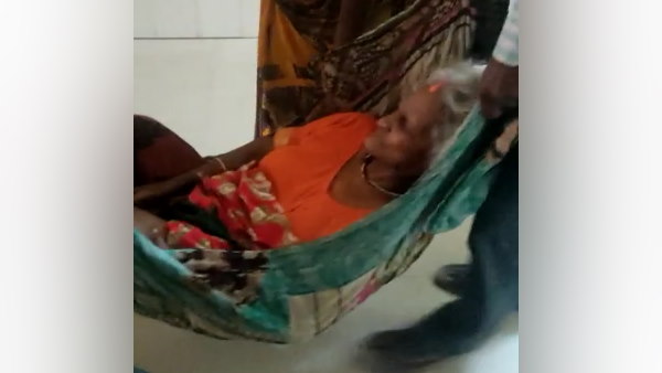 Video of family members carrying patient in sheet goes viral