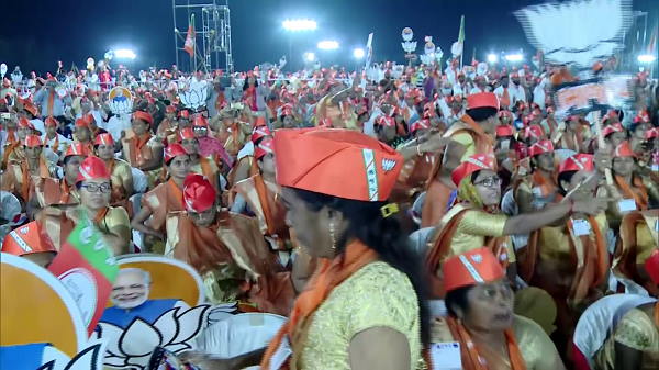 WATCH Video Of PM Narendra Modi roadshow in Vapi Valsad Gujarat WATCH Video Of PM Narendra Modi roadshow in Vapi Valsad Gujarat