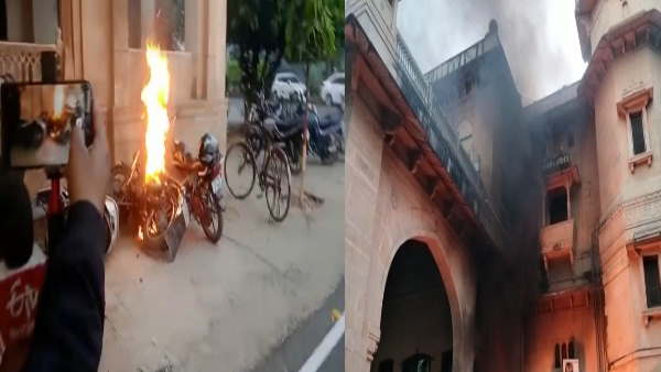 up prayagraj allahabad university student protest fight security gaurds and protesters bikes burned 