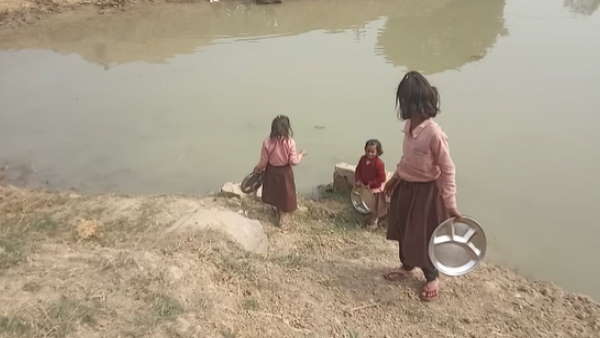 uttar pradesh news sonbhadra government school video viral minors washing plates on lakeside 