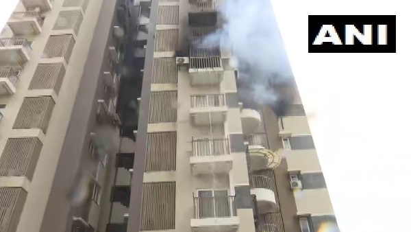Ahmedabad flat caught fire Ahmedabad flat caught fire
