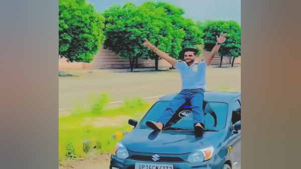 young man sat on the bonnet of a speeding car as soon as it went viral the police took action 