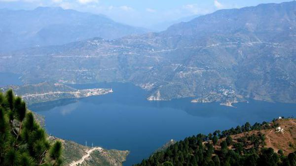 Tehri lake jheel Fun adventure water sports tourism boating floating house nature 