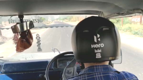 Hamirpur the four wheeler driver challaned for not wearing helmet now driver wearing while driving
