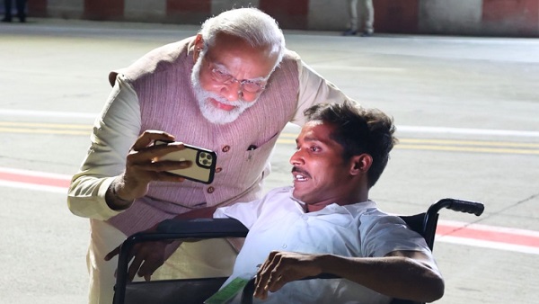 PM Narendra Modi selfie specially-abled BJP worker