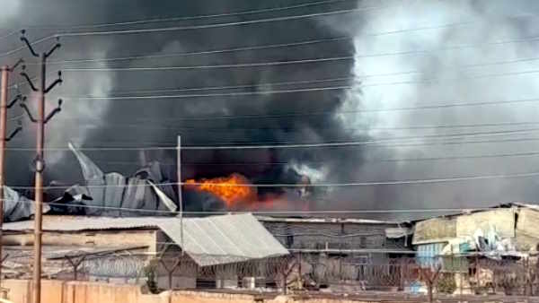 Vrindavan fire in Prem Mandir godown fire brigade present on spot smoke visible from kilometers 