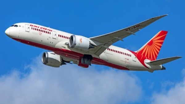 Female friend in Air India plane cockpit 