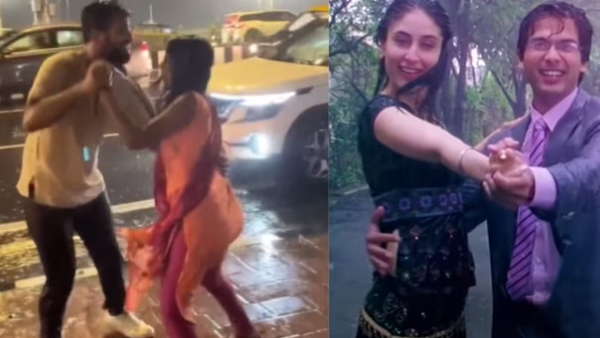 Couple dances in Mumbai rain