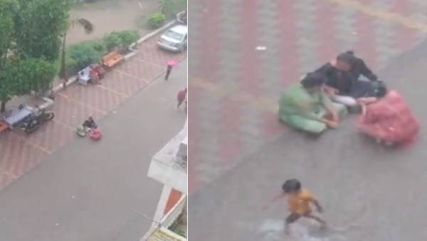 Woman gossiping while rain pouring
