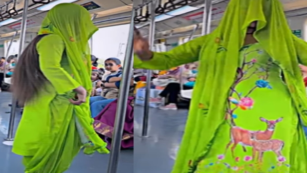 Woman dances in delhi metro