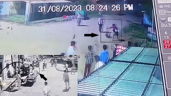 man beats dog with a stone after dog bite his son in Auraiya captured in CCTV man beats dog with a stone after dog bite his son in Auraiya captured in CCTV