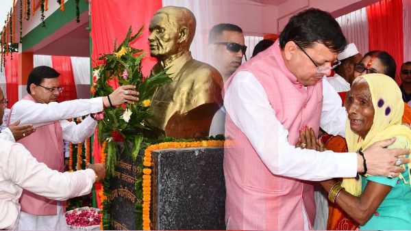 CM PUSHKAR Dhami unveiled statues of state agitators at martyr site Khatima.