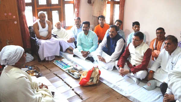 CM Pushkar Dhami at Puran Chandra home