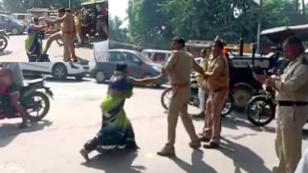 video of a women beating a policeman with slippers in mathura goes viral video of a women beating a policeman with slippers in mathura goes viral