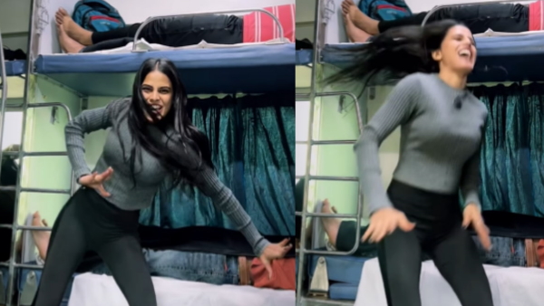girl dances in moving train