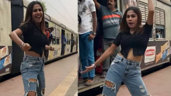 Girl dancing in train in front of people