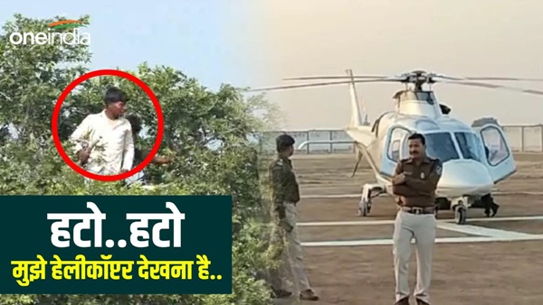 Amazing-craze-to-see-helicopter-person-climbed-high-tree