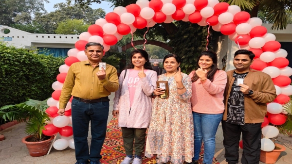 Commissioner Deepak Singh and his wife arrived to cast their vote in the great festival of democracy.