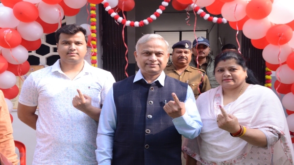 Commissioner Deepak Singh and his wife arrived to cast their vote in the great festival of democracy.