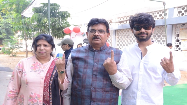 Commissioner Deepak Singh and his wife arrived to cast their vote in the great festival of democracy.