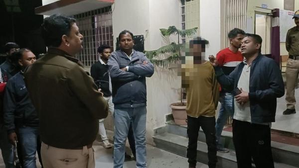 Betul beating up Ashish Parate, a tribal youth who runs a tea-snack shop, by hanging him upside down Betul beating up Ashish Parate, a tribal youth who runs a tea-snack shop, by hanging him upside down