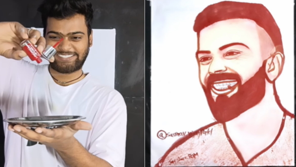 Virat Kohli painting with the help of tongue
