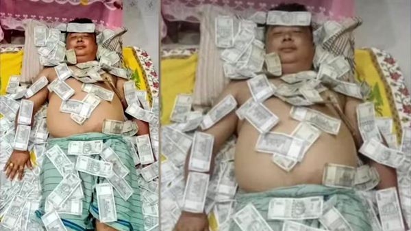assam-leader-seen-sleeping-with-currency