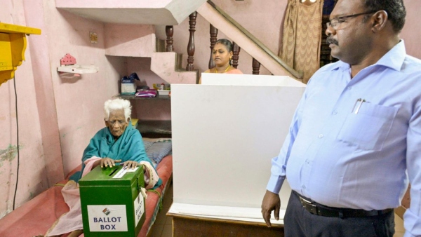 Elderly citizens vote via postal ballot