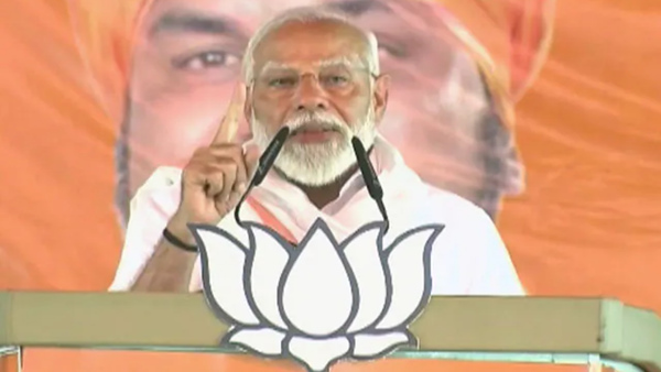 PM Modi targets I N D I A over corruption