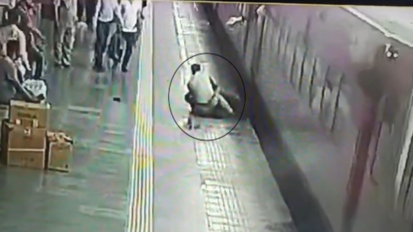 Railway Cop Saves Man