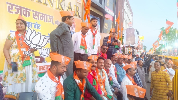 PM Narendra Modi did a historic road-show for BJP candidate Alok Rajak Samaj showered flowers