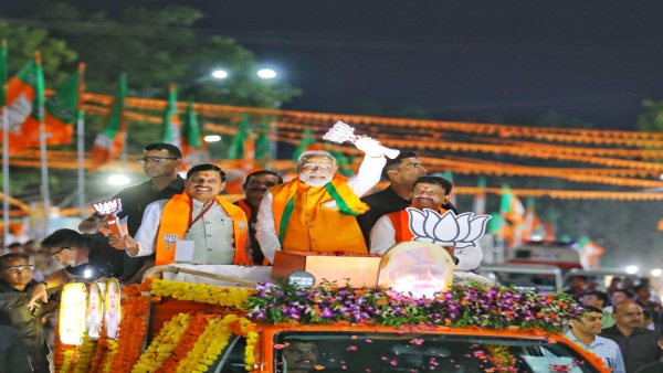 PM Narendra Modi did a historic road-show for BJP candidate Alok Rajak Samaj showered flowers