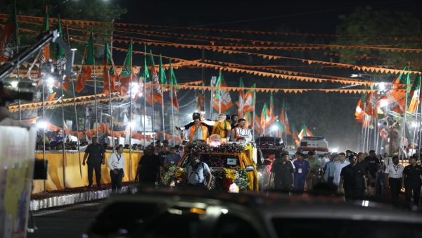 PM Narendra Modi did a historic road-show for BJP candidate Alok Rajak Samaj showered flowers
