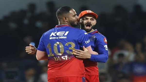 Yash Dayal and Virat Kohli