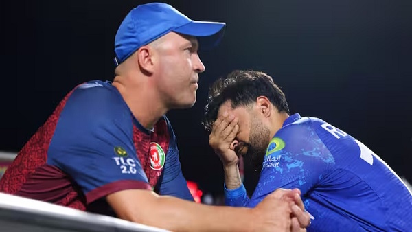 Jonathan Trott with Rashid Khan Jonathan Trott with Rashid Khan