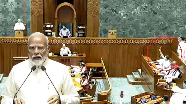 Rahul Gandhi shows copy of Constitution to PM Modi